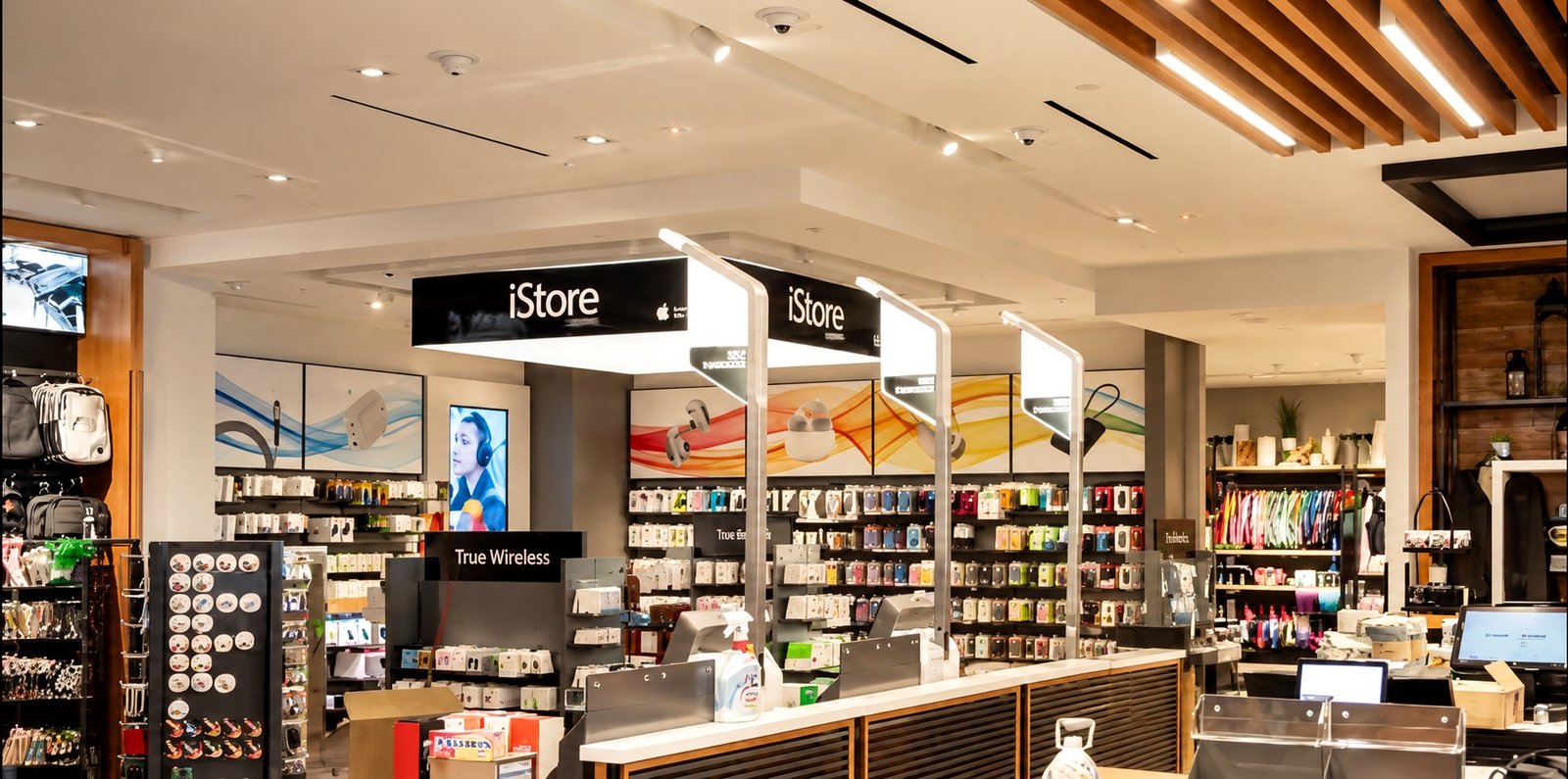 Finished retail interior featuring architectural ceiling details